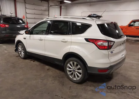 2017 Ford Escape Titanium z USA, uszkodzony, nr VIN 1FMCU0J96HUC25652